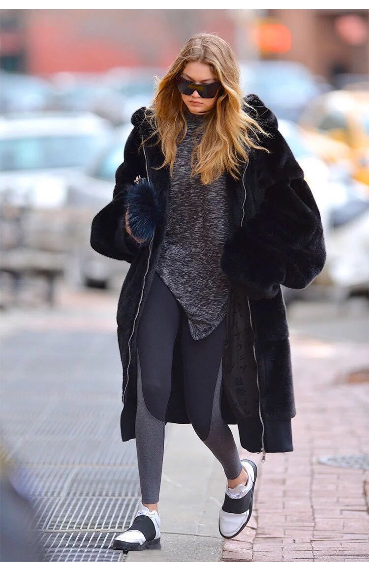 Women's oversized faux fur coat with hood and pockets