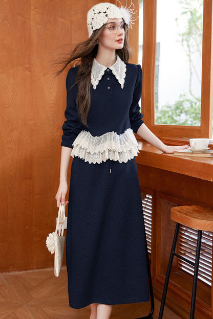 Full view of navy blue lace-collar blouse and maxi skirt outfit with crochet hat
