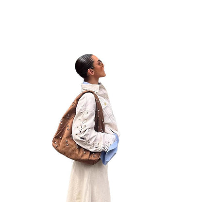 Dulcira | Ladies Designer Handbag with Decorative Pearl Details and Unique Cut