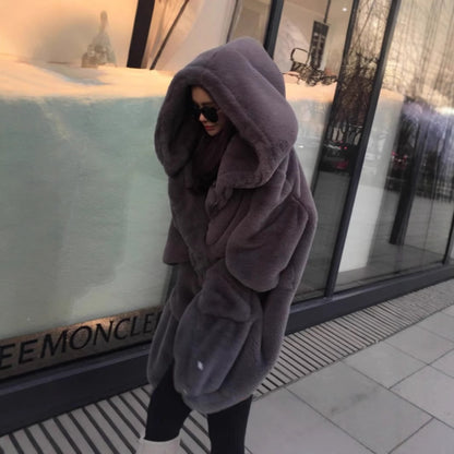 Women's oversized faux fur coat with hood and pockets
