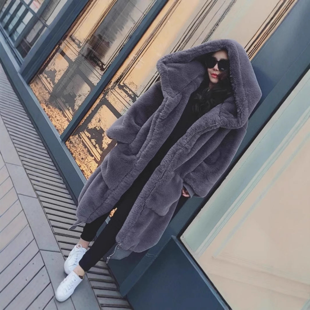 Women's oversized faux fur coat with hood and pockets