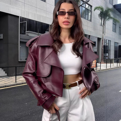 Dulcira | Women's oversized faux leather jacket with statement cuffs