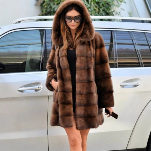 Women's fashionable faux fur coat with hood and cozy lining